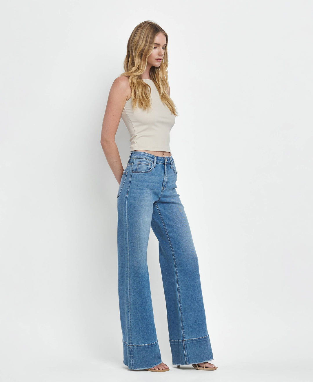 High Rise A Line Raw Hem Jeans