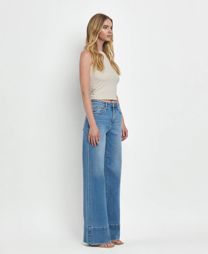 High Rise A Line Raw Hem Jeans