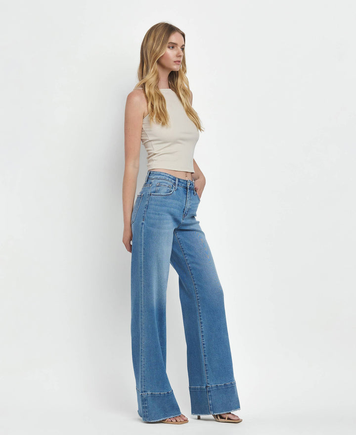 High Rise A Line Raw Hem Jeans