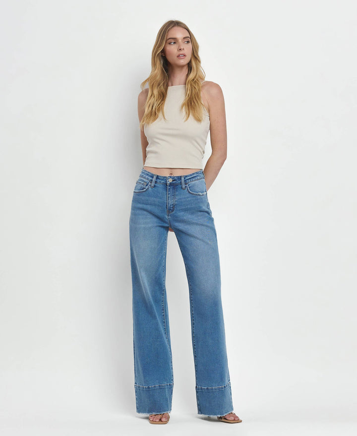 High Rise A Line Raw Hem Jeans